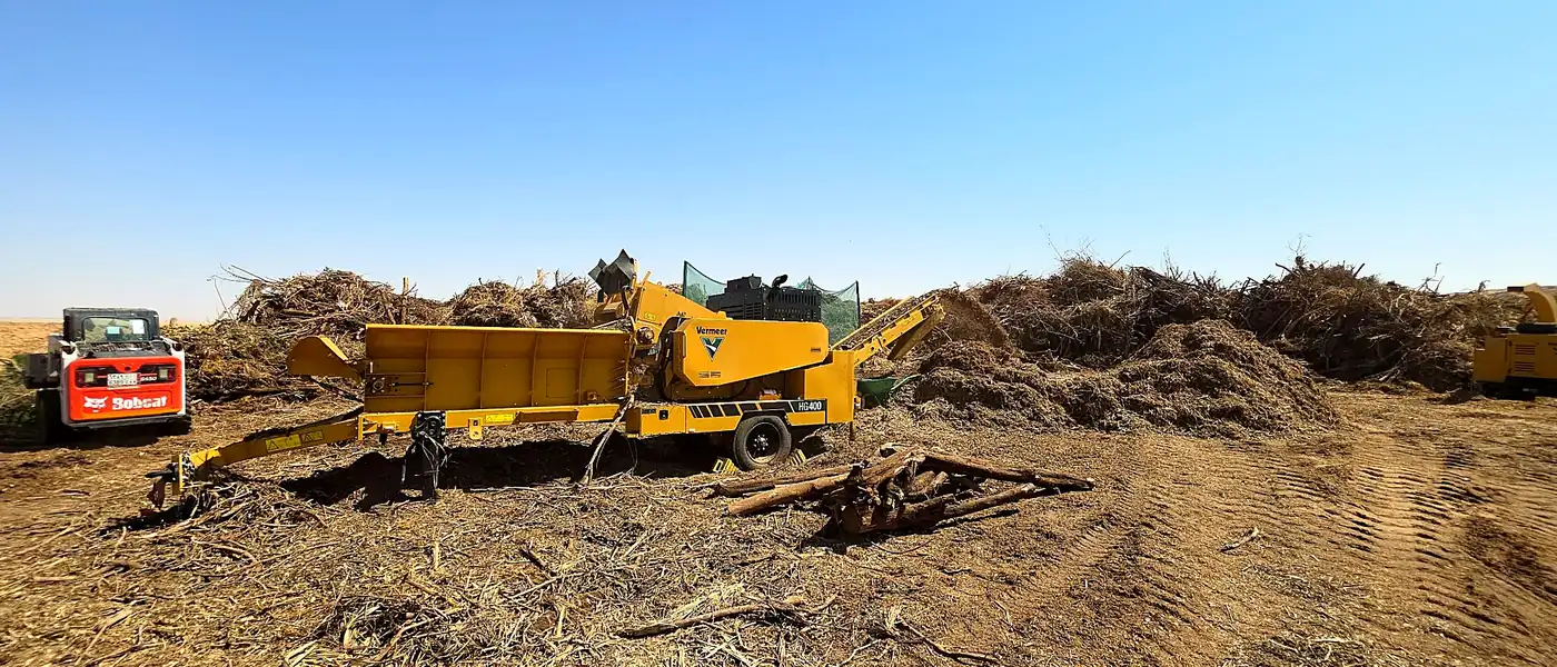 Incoming landscape material inspected and fed to the screening plant
